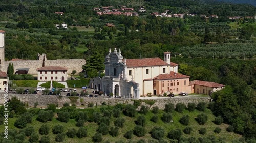 4K drone video of Castello del Garda and Polpenazze del Garda, Italy. Historic medieval fortress with panoramic views of Lake Garda and Valtenesi region.