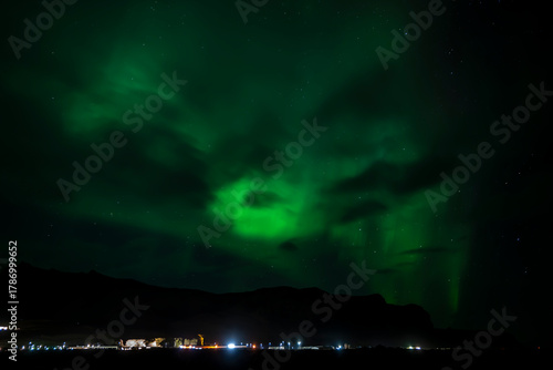 Wallpaper Mural Aurora borealis, northern lights over Reykjavik, Iceland Torontodigital.ca