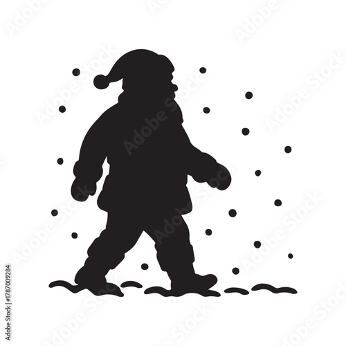 Silhouette of Santa Claus walking in the snow during winter holidays