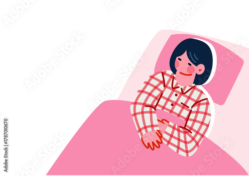 夜ベットで眠るパジャマ姿の女性