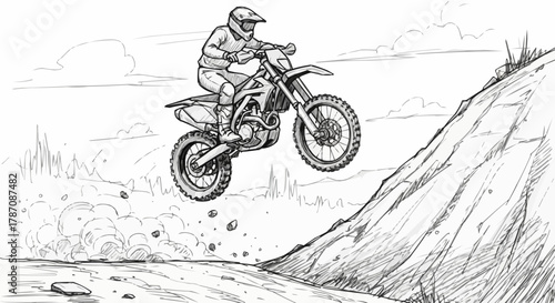 Motocross rider soaring through the air on a dirt bike.