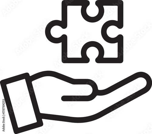 Hand holding a puzzle piece symbolizing solutions and ideas