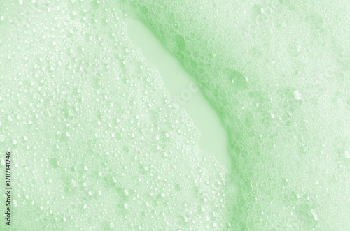 The texture of detergent foam or shampoo or shaving gel.