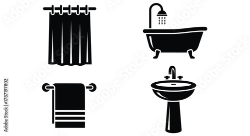 Modern bathroom suite features bathtub sink and towel for clean design