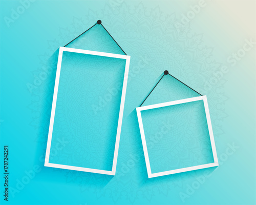 hanging frames with floral design on Blue Gradient Background