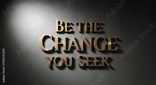 Inspirational quote displayed on a dark wall with shadows emphasizing the message to motivate positive change and personal growth