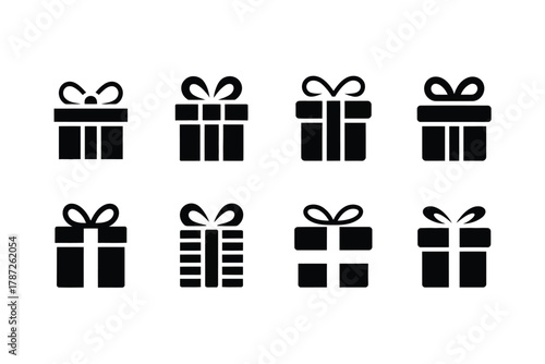 A collection of eight simple black gift box icons with bows on a white background.
