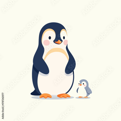 A large penguin standing next to a small baby penguin
