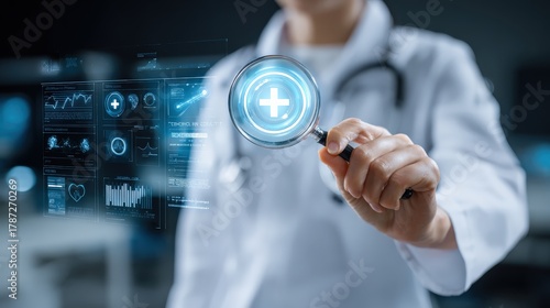A healthcare professional holds a magnifying glass, examining digital health data displayed on a screen, symbolizing innovation in medical technology.