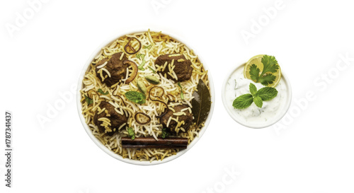 Delicious Indian Biryani Dish with Raita Served on a White Plate
