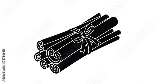 Bundled cinnamon sticks tied with a ribbon, a warm and aromatic spice for cooking and baking