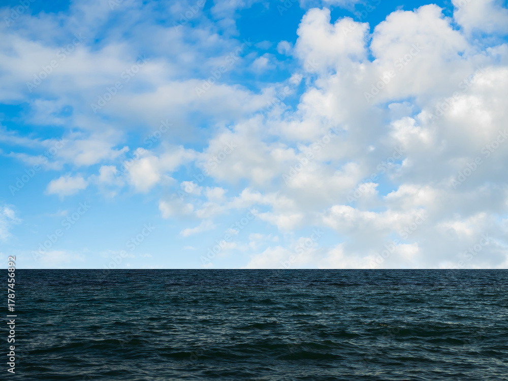 Fototapeta premium Sea ocean texture blue water nature with blue sky background, abstract shore clean calm natural summer for tourism travel in holidays, island deep surface.