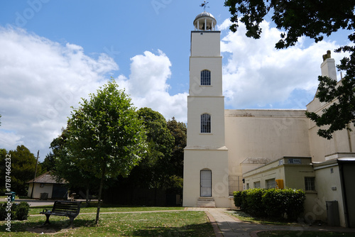 Hotham Park Clock Tower and Park Bench in Bright Summer Sunlight, Bognor Regis