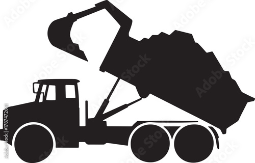 Silhouette of excavator loading earth on dump truck isolated gray backdrop
