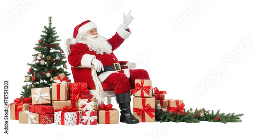 Santa Claus pointing upwards sitting on an armchair near Christmas tree and presents on transparent background
