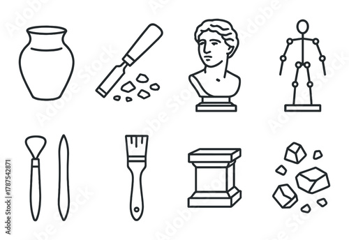 Artistic sculpting tools and classical elements on a dark background