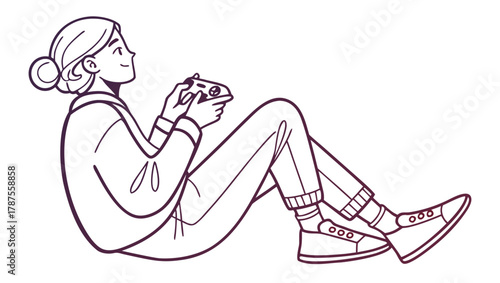 Happy young woman enjoying leisure time, sitting comfortably on the floor and intensely playing video games with a modern controller, illustrating relaxation and entertainment
