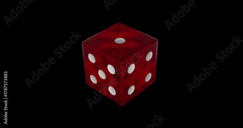 A red casino die with white dots on it, rotating and showing all its sides, isolated on a black background. The dice has a glassy material