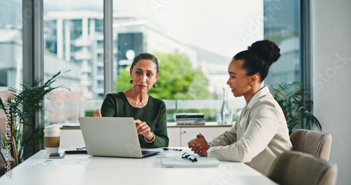 Fototapeta Computer, discussion and business women in office with feedback on corporate performance review