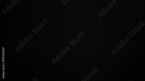 Sun glare, lens flare on a black background for transition to video. Colored rays	