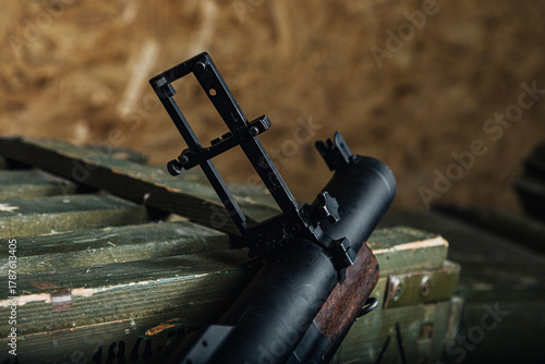 Konstfotografi weapon parts on field station, military firearm assembly displayed during field