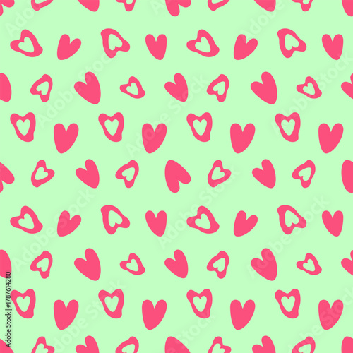 Funky seamless heart pattern featuring solid and outlined pop pink hearts on a mint green background, perfect for youthful teen designs, children's decor, or vibrant stationery.