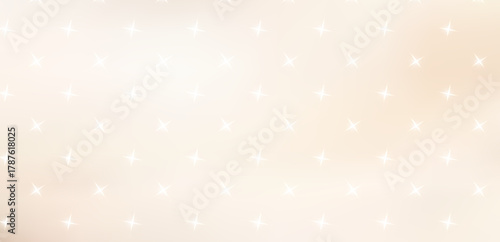 Light background with bokeh and abstract texture of silver sparkles.Blurred ivory background with silver sparkles.