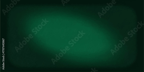 Dark green grunge chalkboard texture background with a subtle light pattern and chroma key blank canvas design concept