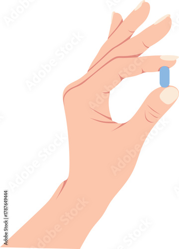 Hand delicately holding a small blue medication pill