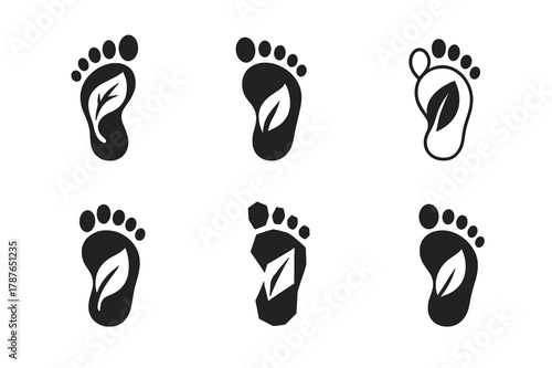 Leaf Footprint Logos. Hidden trail. Set Logo of Hidden trail: leaf-marked footprint. harmonious logo variations of the same emblematic concept, each with