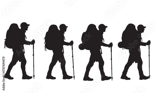 Hikers with backpacks and trekking poles silhouette