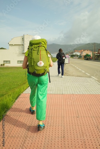Fotografie Pilgrims on the Way of Santiago, two girls are walking