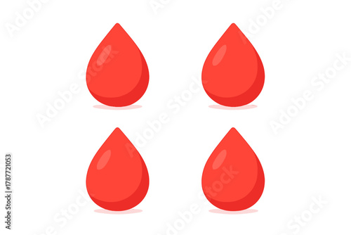 Four bright red liquid drops isolated on a clean white background