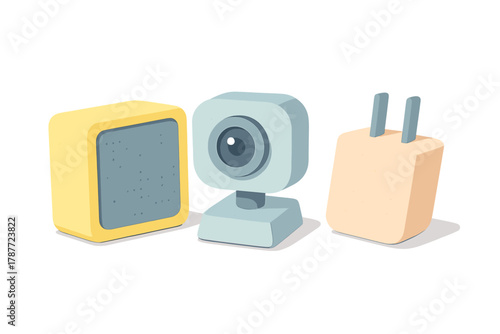 Collection of small electronic gadgets including speaker, webcam, and power adapter