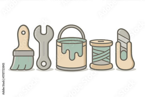 Assortment of crafting and repair implements: brush, wrench, paint can, and thread spool
