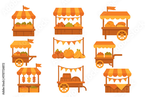Assortment of wooden market stalls and mobile food carts with seasonal harvest produce