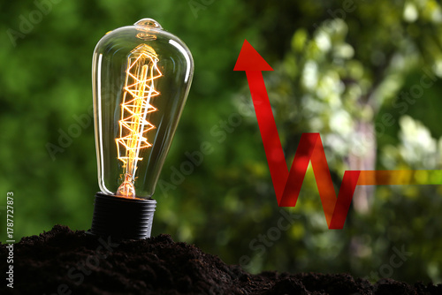 Glowing light bulb and gree...