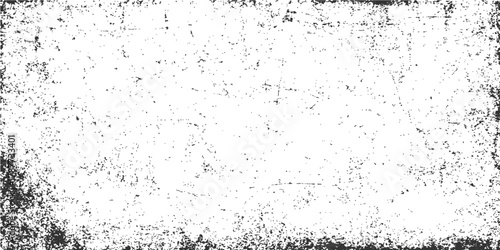 Abstract grunge background texture featuring a dirty, old wall surface with black paint splash design and a vintage frame for your text