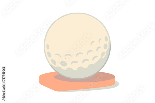 Dimpled white golf ball resting on small orange tee