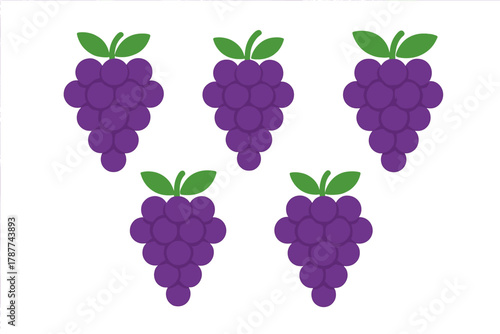 Five bunches of purple grapes with green leaves isolated on white