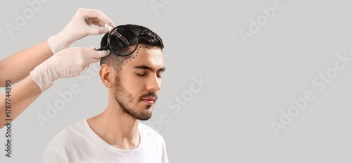 Trichologist applying serum...