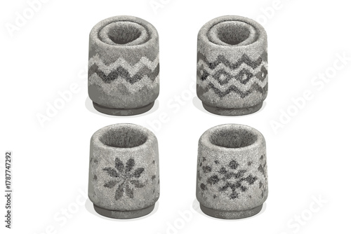 Four isometric gray cylindrical holders with distinct winter knit patterns