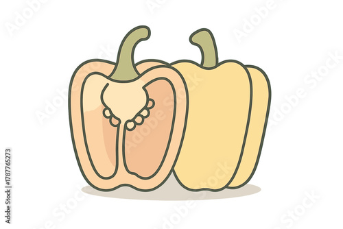 Whole and halved yellow bell pepper with visible seeds