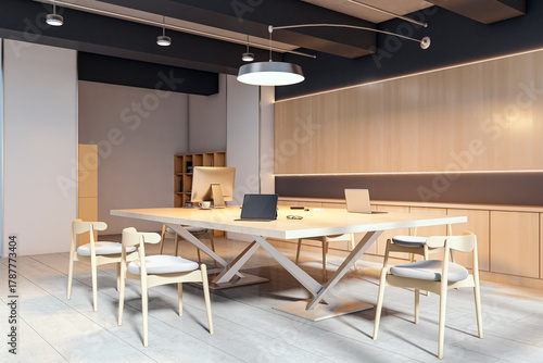 Fototapeta Naklejka Na Ścianę i Meble -  Modern light wood conference room interior with computers and elegant chairs in a stylish office environment with soft ambient lighting. 3D Rendering