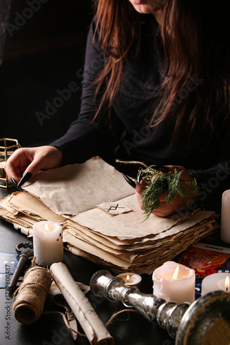 Witch with spell book and h...