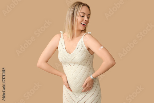 Young pregnant woman after ...