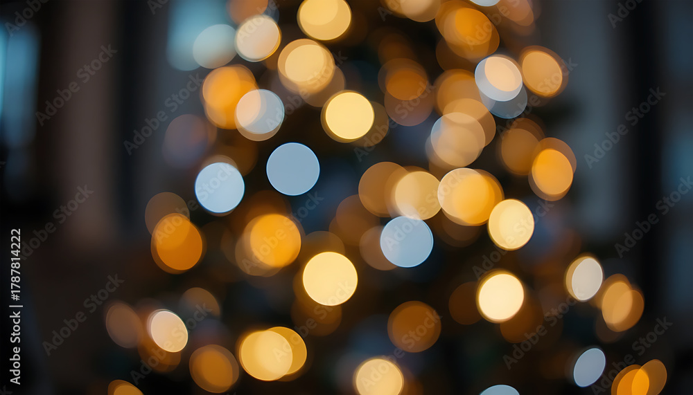 Fototapeta premium Blurred Warm Christmas Tree Lights with Bokeh Effect in Dark Background