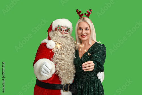 Santa Claus and beautiful m...