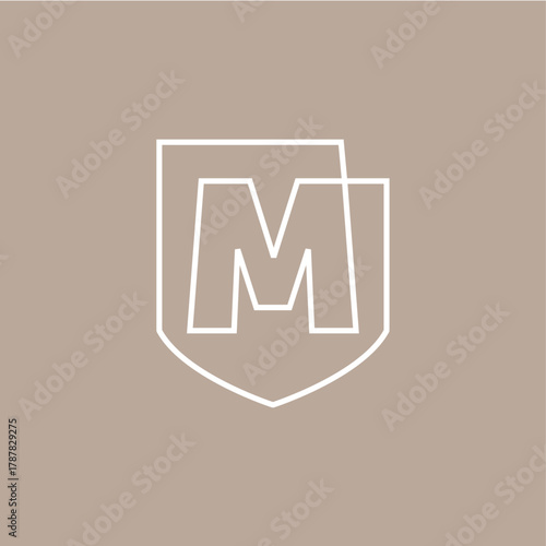 m letter shield protection security logo vector icon illustration