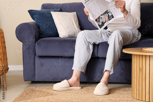 Man in soft slippers restin...